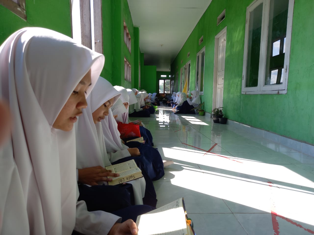 membaca al-quran